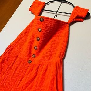 Orange off the shoulder jumpsuit